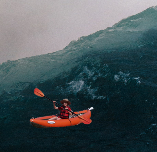 Lone kayaker about to go over Niagra Falls